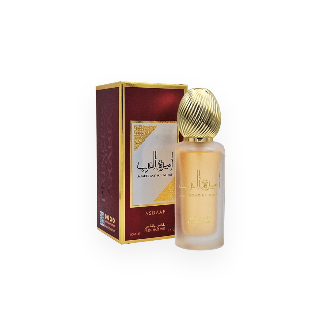 Packshot de la brume capillaire Ameerat Al Arab 50 ml par Asdaaf, avec un flacon givré orné de détails dorés et un bouchon sculpté en forme de dôme doré, accompagné d'une boîte rouge profond avec des accents dorés, reflétant une allure luxueuse et élégante.